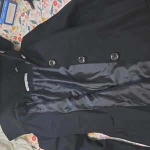 Usado como nuevo coat